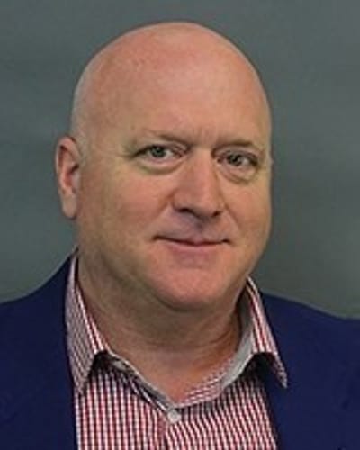 Portrait of Clint Ballinger, PhD